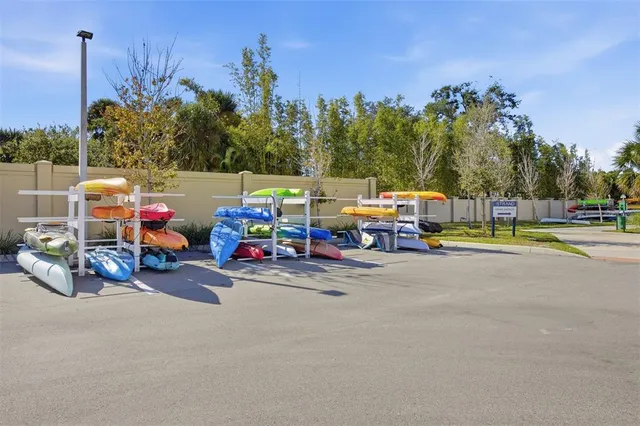 a view of a lake with outdoor seating