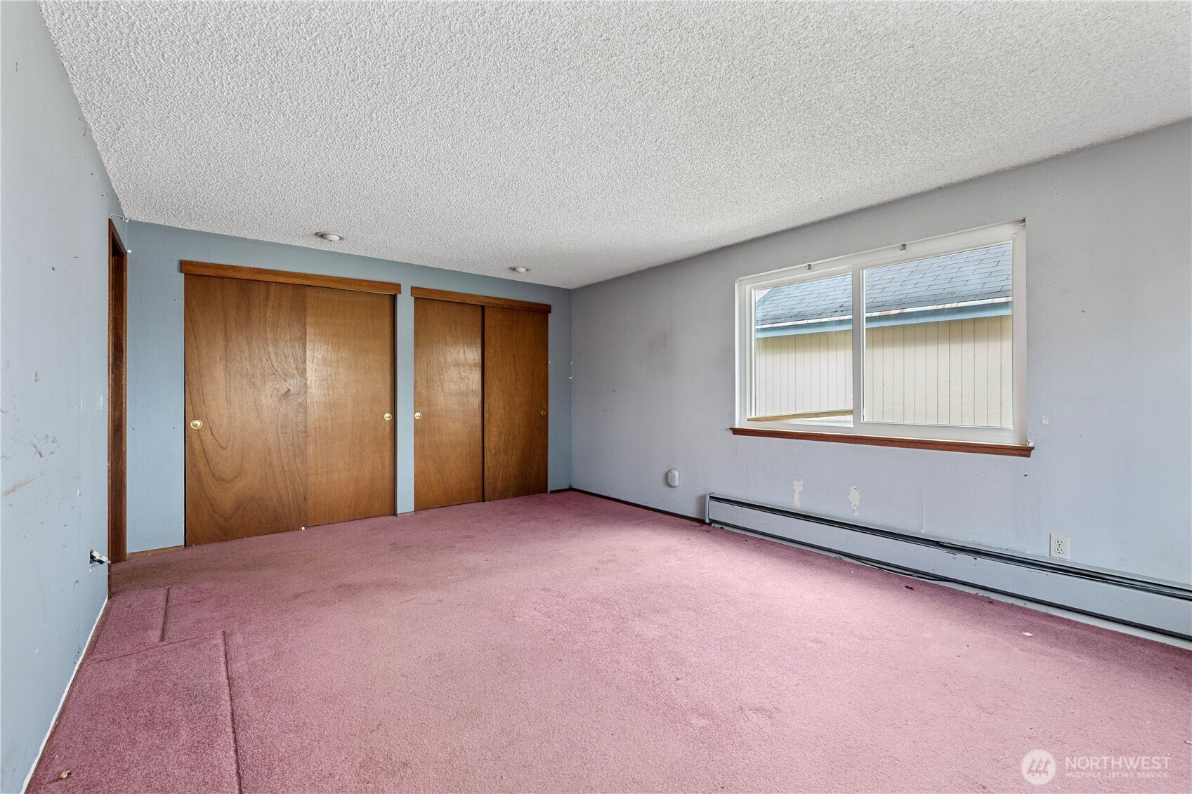 15 76th Street Southwest Everett, WA 98203 - Photo 11 of 39 an empty room with windows and closet