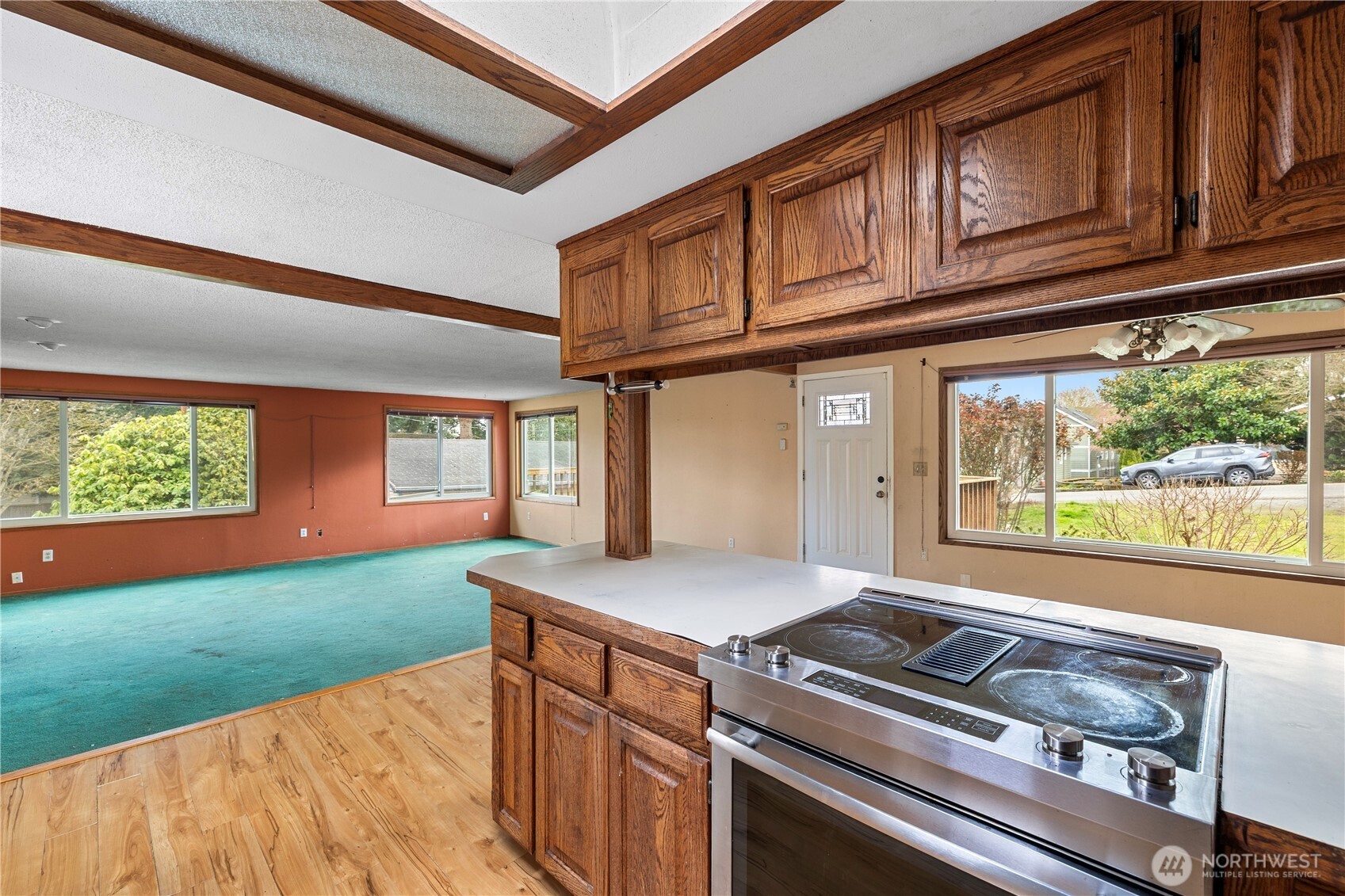 15 76th Street Southwest Everett, WA 98203 - Photo 22 of 39 a kitchen with a stove and a white cabinet