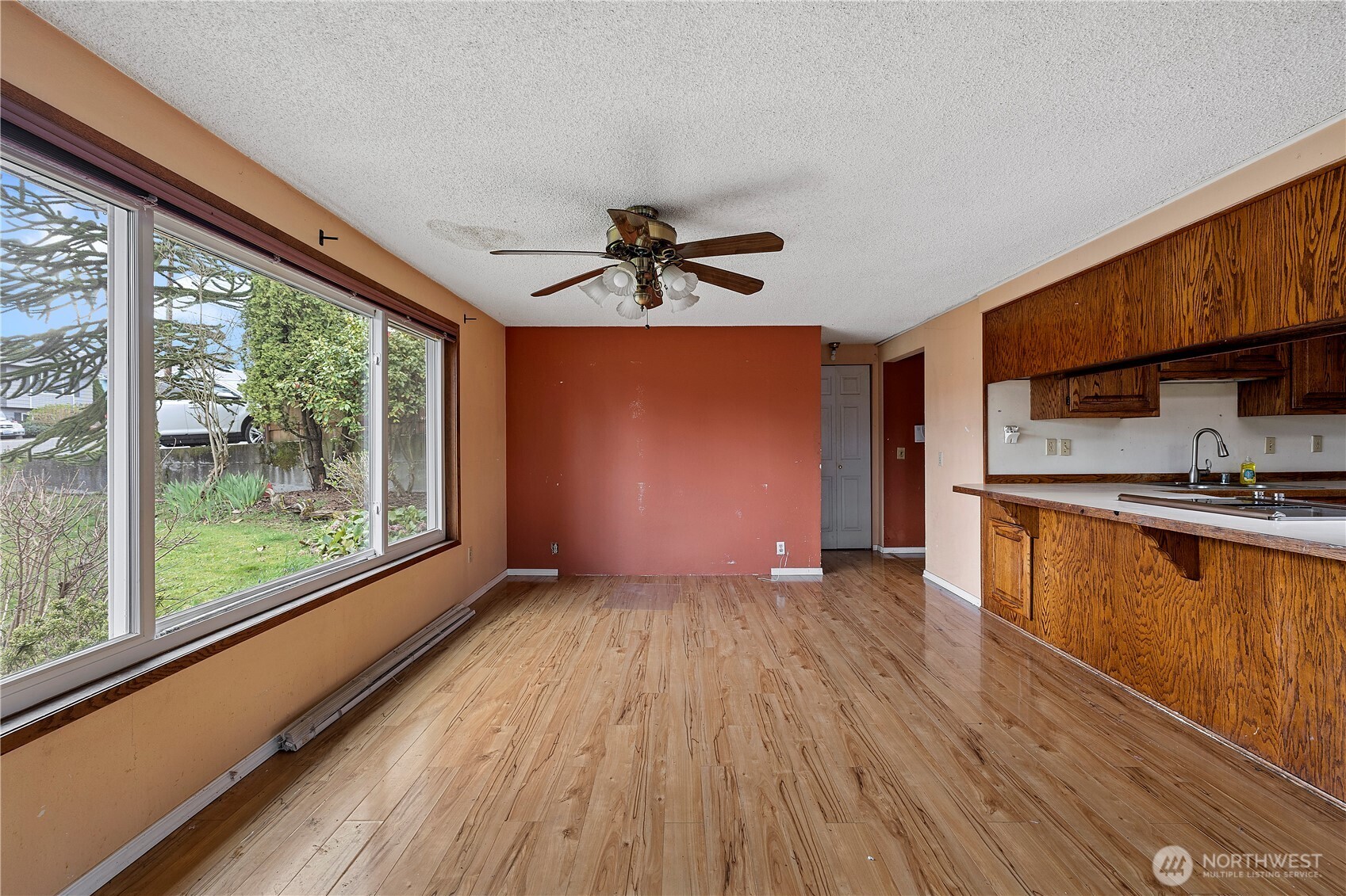 15 76th Street Southwest Everett, WA 98203 - Photo 24 of 39 a view of empty room with wooden floor and fan