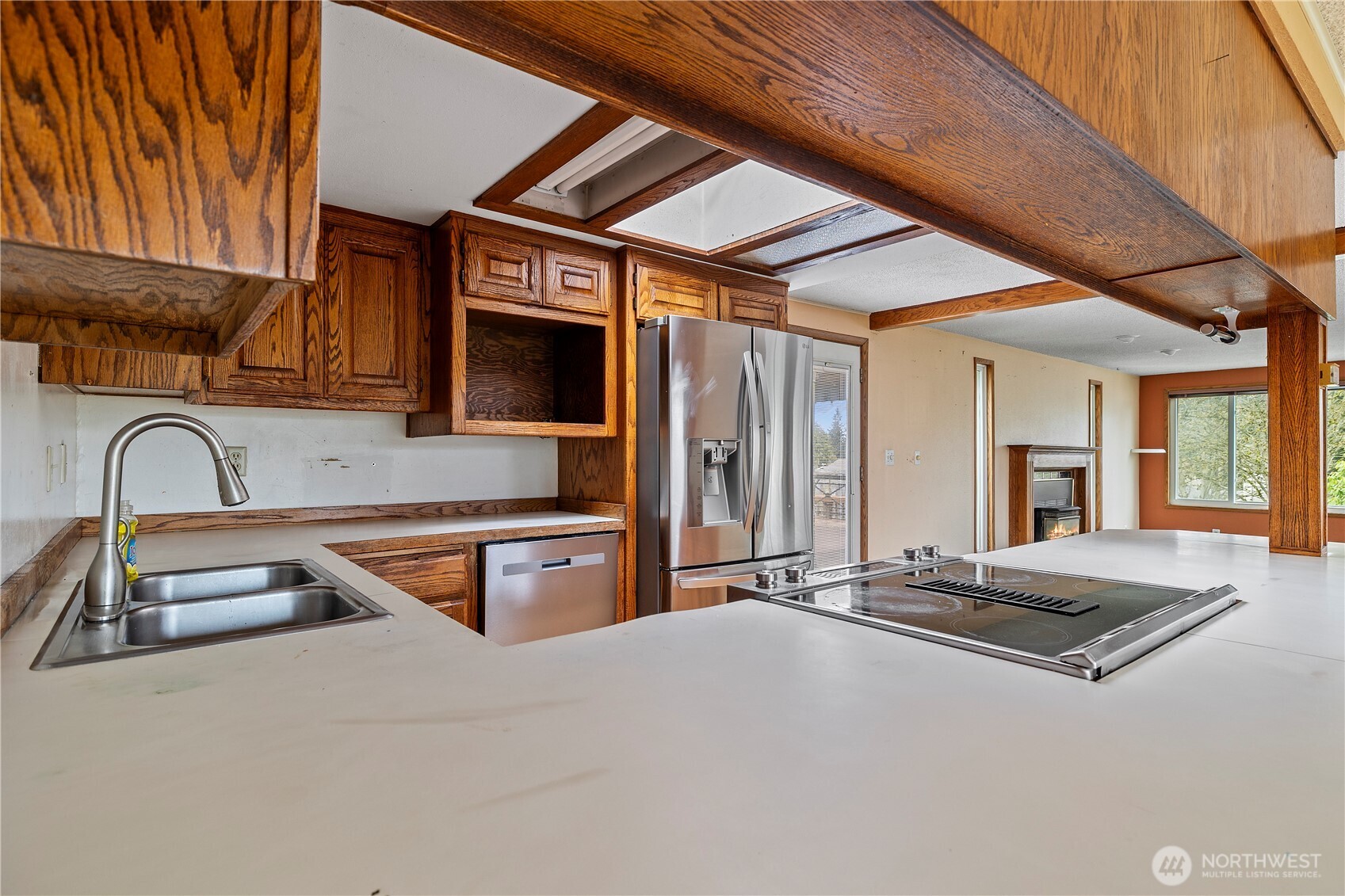 15 76th Street Southwest Everett, WA 98203 - Photo 26 of 39 a kitchen with granite countertop a sink and a stove top oven