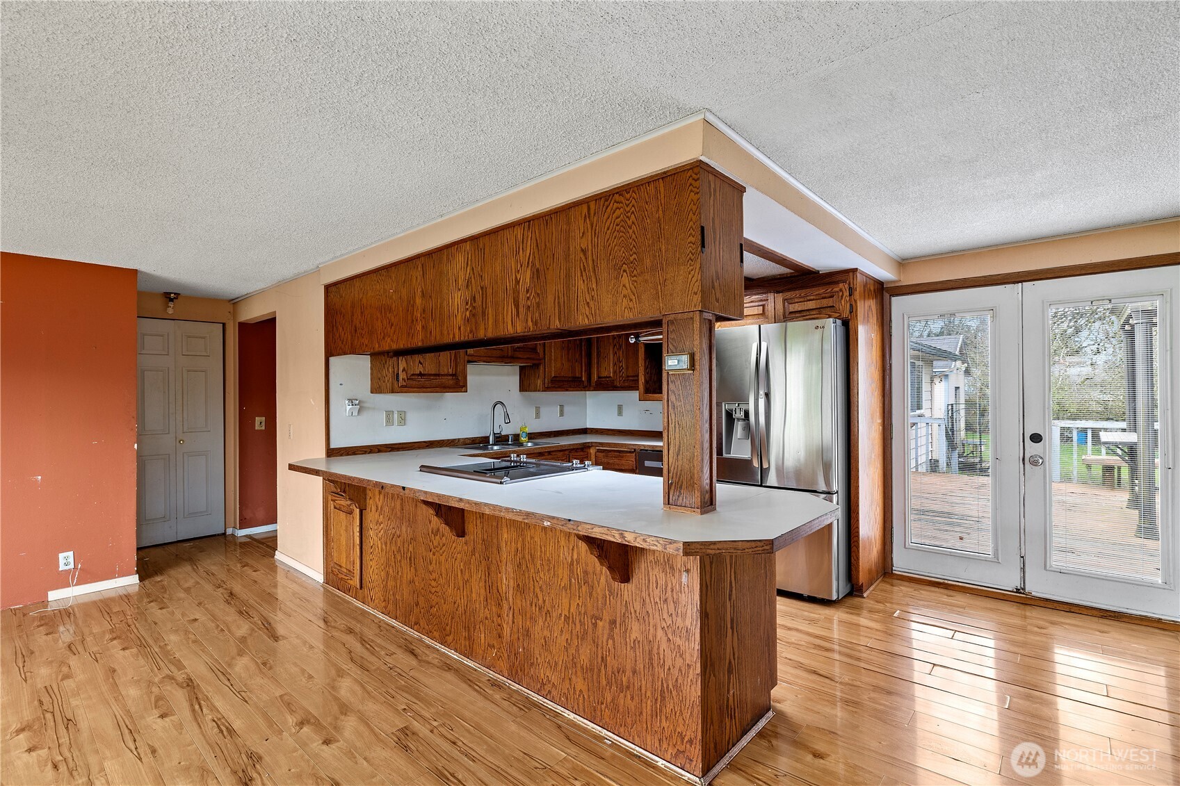 15 76th Street Southwest Everett, WA 98203 - Photo 27 of 39 a kitchen with stainless steel appliances granite countertop a sink stove and refrigerator