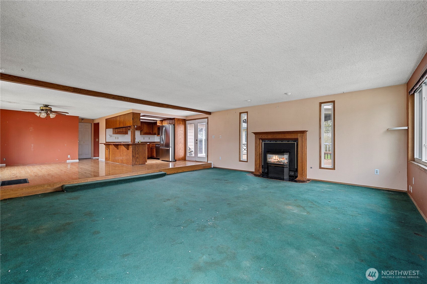 15 76th Street Southwest Everett, WA 98203 - Photo 8 of 39 a living room with furniture and a fireplace