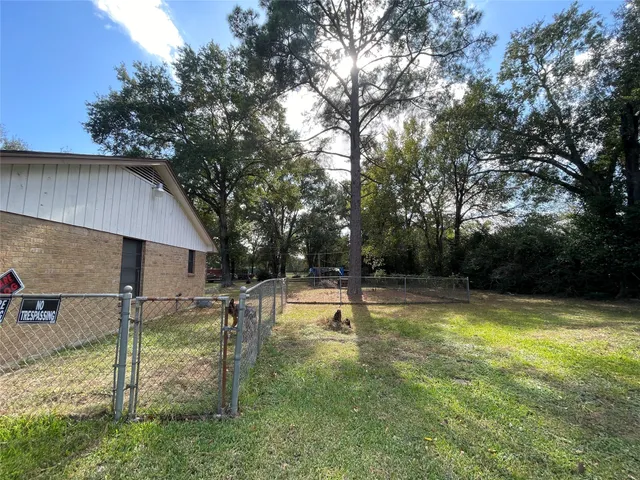 a view of a house with swimming pool
