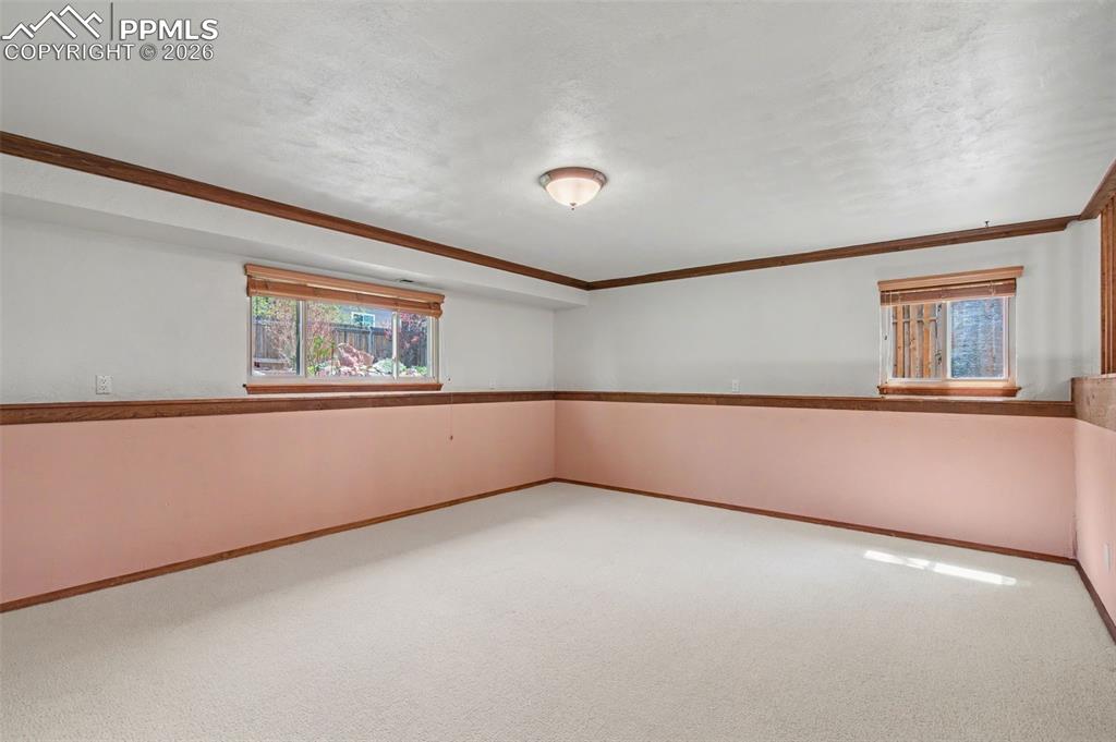 5301 Pinon Valley Road Colorado Springs, CO 80919 - Photo 13 of 27 an empty room with a window