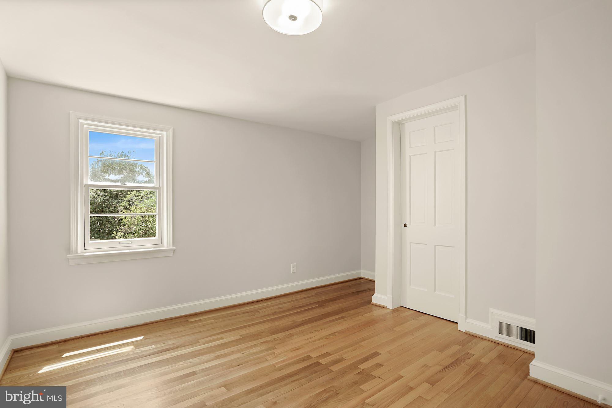 5622 Knollwood Road Bethesda, MD 20816 - Photo 21 of 37 Bedroom Five with View of Backyard