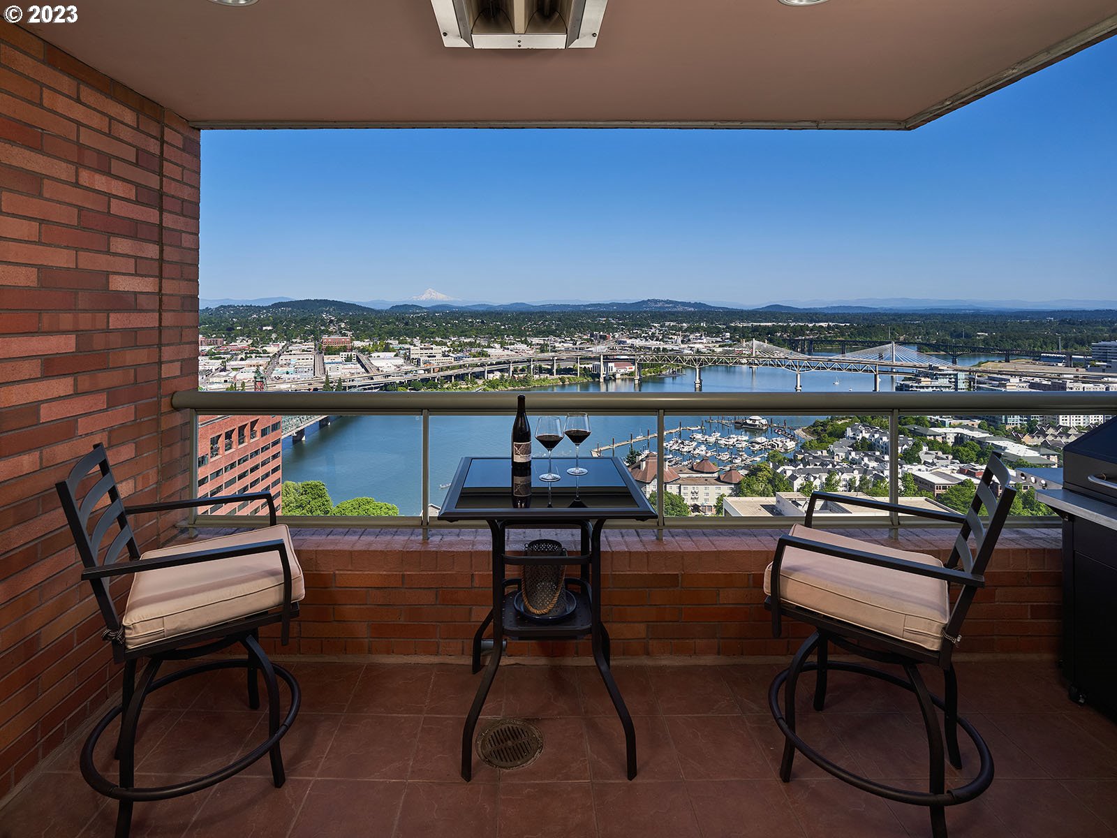 1414 Southwest 3rd Avenue, Unit 2502 Portland, OR 97201 - Photo 14 of 41 a view of a chairs and table in a terrace