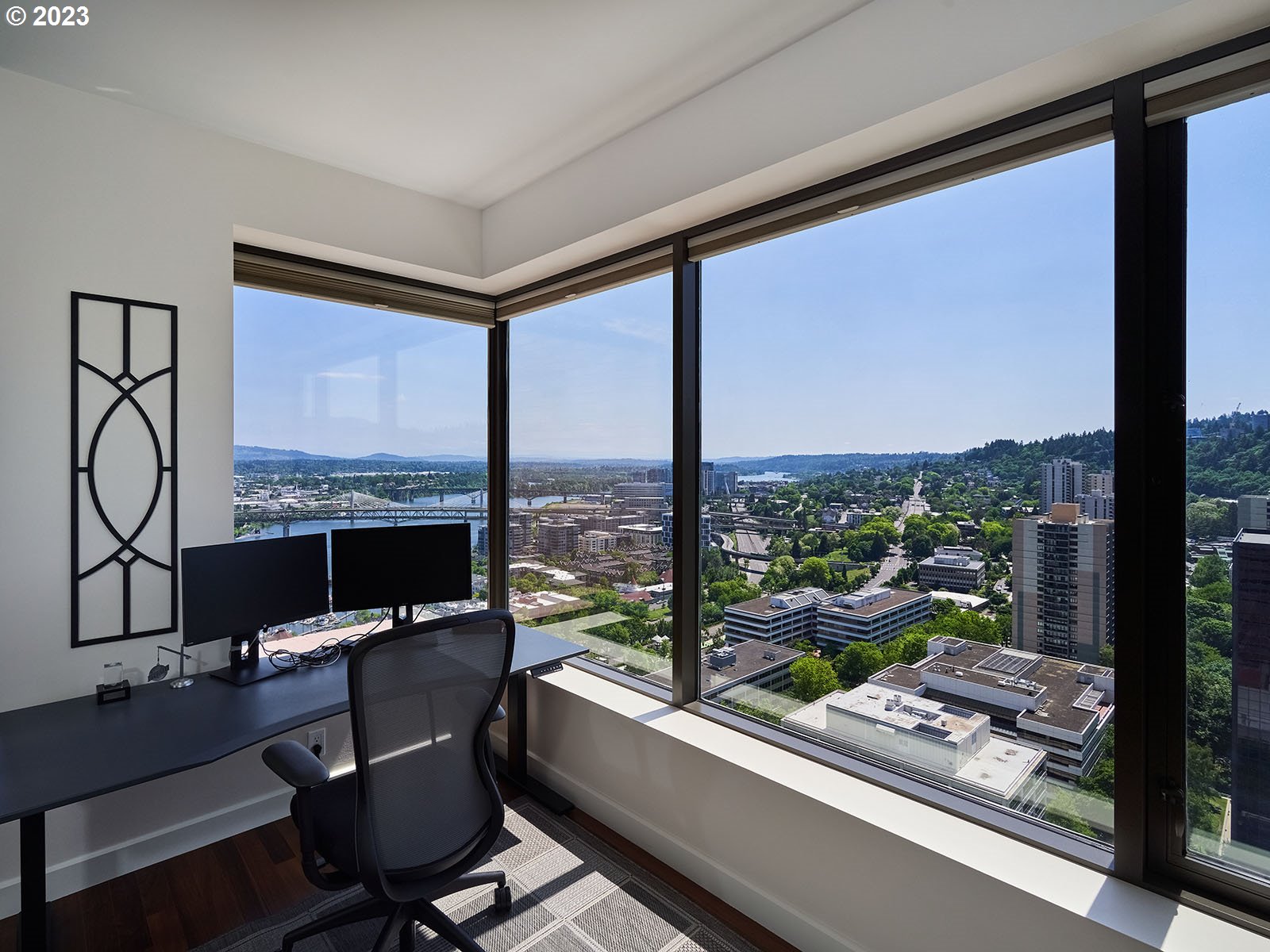1414 Southwest 3rd Avenue, Unit 2502 Portland, OR 97201 - Photo 18 of 41 a room with furniture and a floor to ceiling window