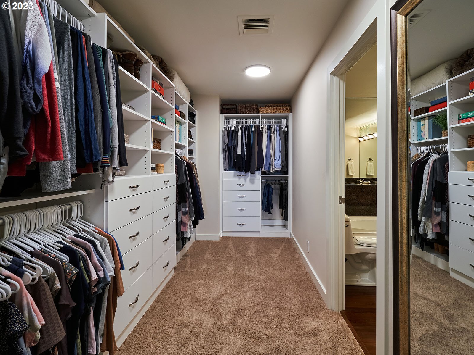 1414 Southwest 3rd Avenue, Unit 2502 Portland, OR 97201 - Photo 20 of 41 a view of walk in closet with clothes and shoes