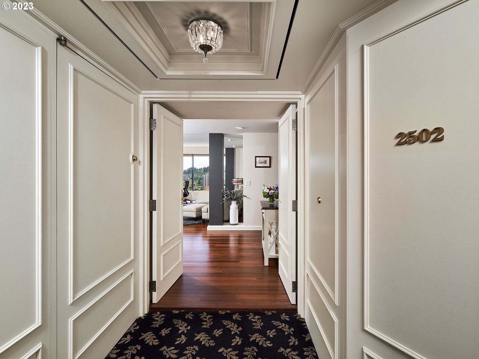 1414 Southwest 3rd Avenue, Unit 2502 Portland, OR 97201 - Photo 2 of 41 a view of a hallway view with wooden floor and staircase