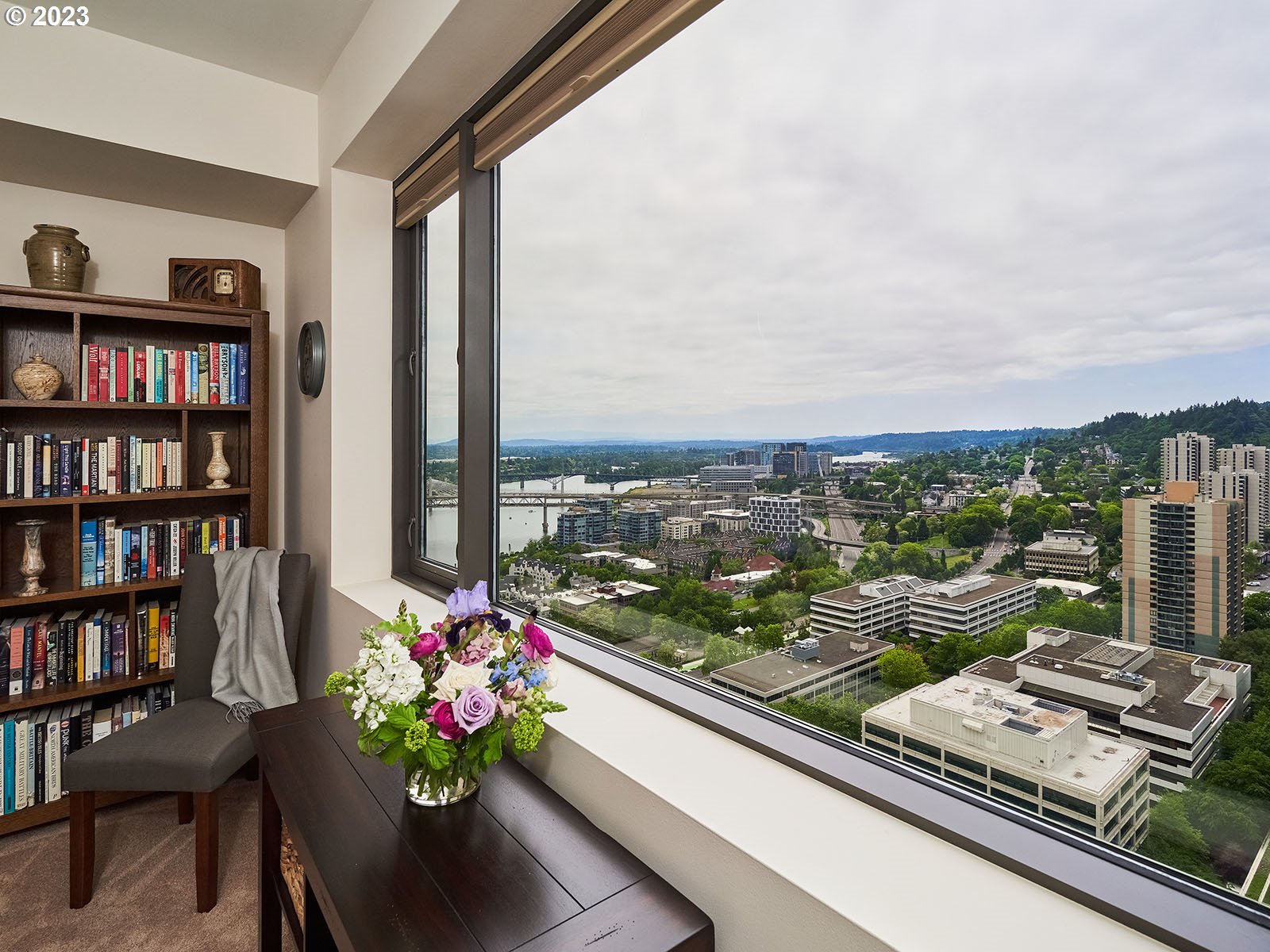 1414 Southwest 3rd Avenue, Unit 2502 Portland, OR 97201 - Photo 22 of 41 a view of a balcony with chair and wooden floor