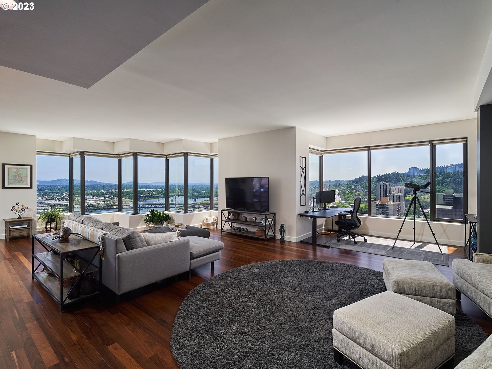 1414 Southwest 3rd Avenue, Unit 2502 Portland, OR 97201 - Photo 3 of 41 a living room with furniture and a flat screen tv