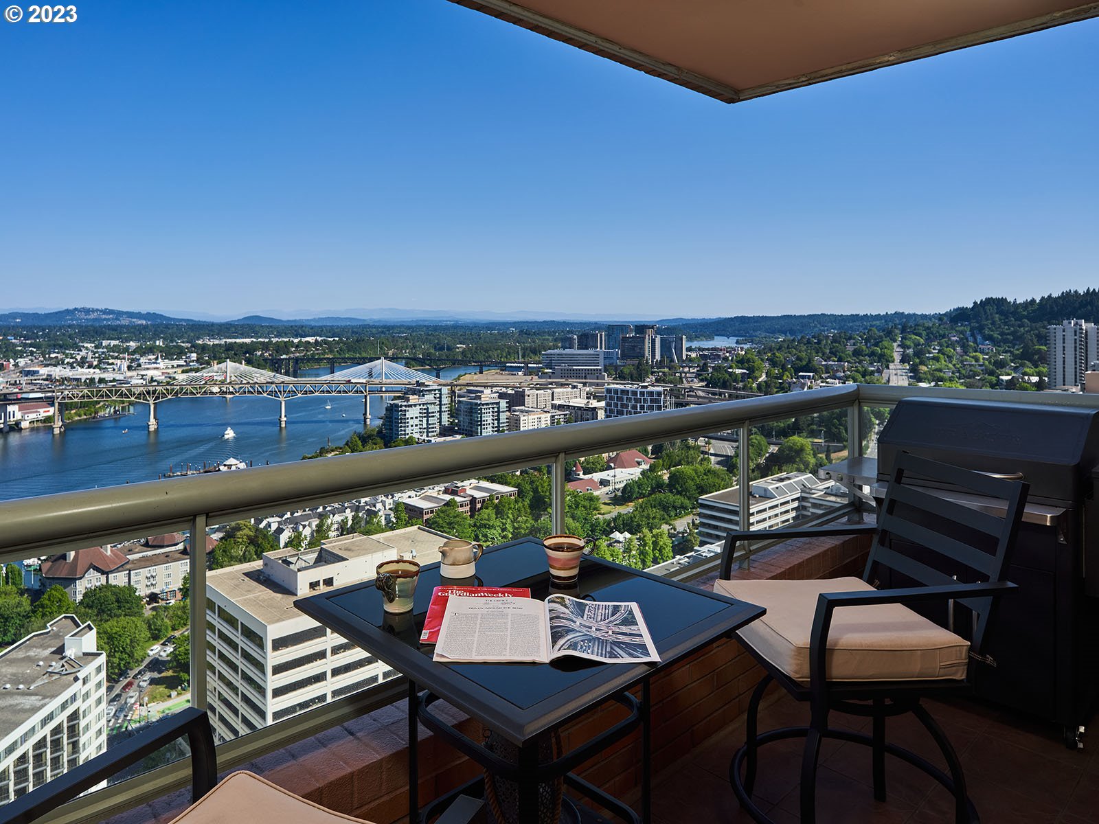 1414 Southwest 3rd Avenue, Unit 2502 Portland, OR 97201 - Photo 9 of 41 a view of a chairs and table in the balcony