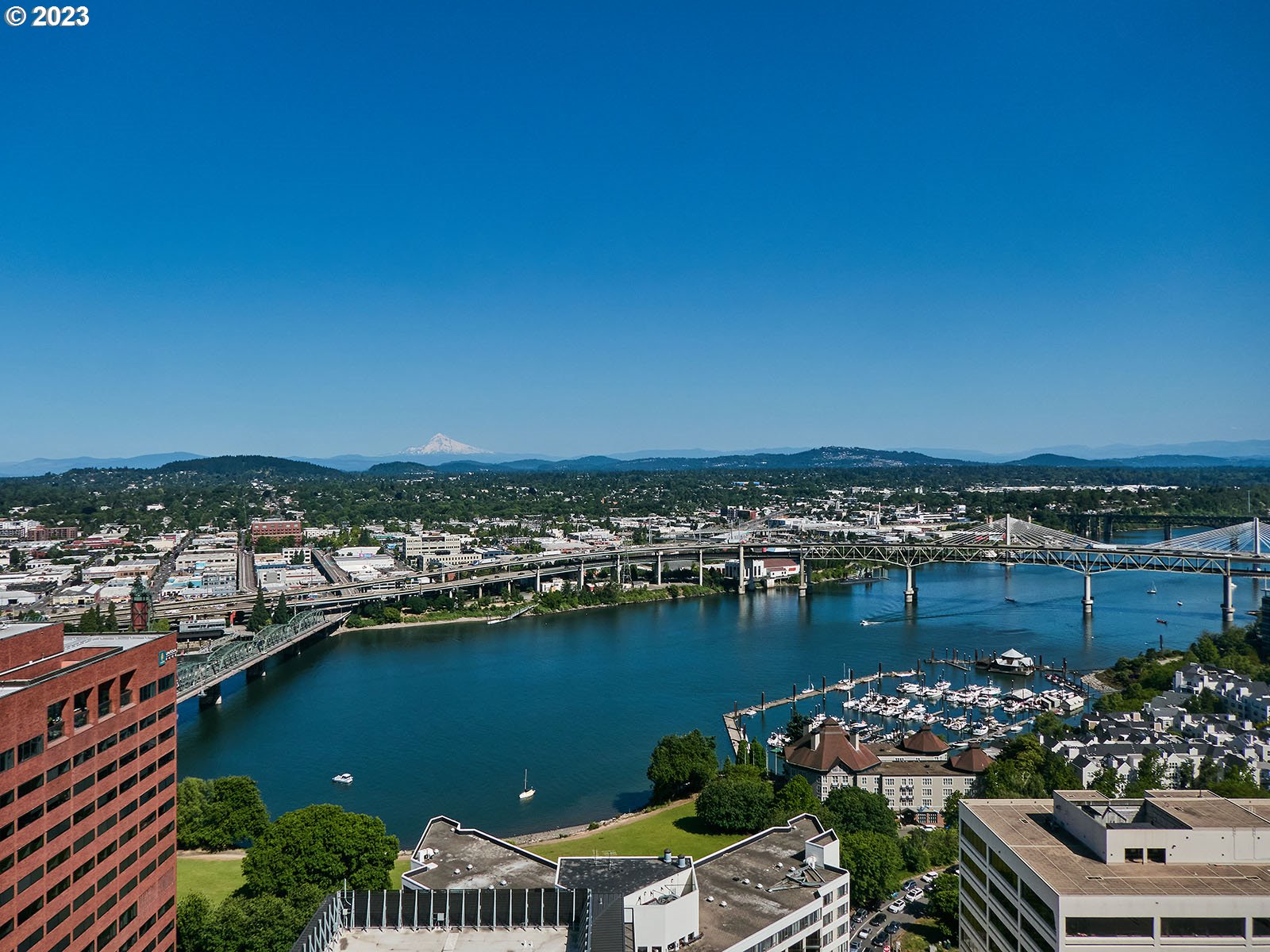 1414 Southwest 3rd Avenue, Unit 2502 Portland, OR 97201 - Photo 10 of 41 a view of a lake with a house in the background