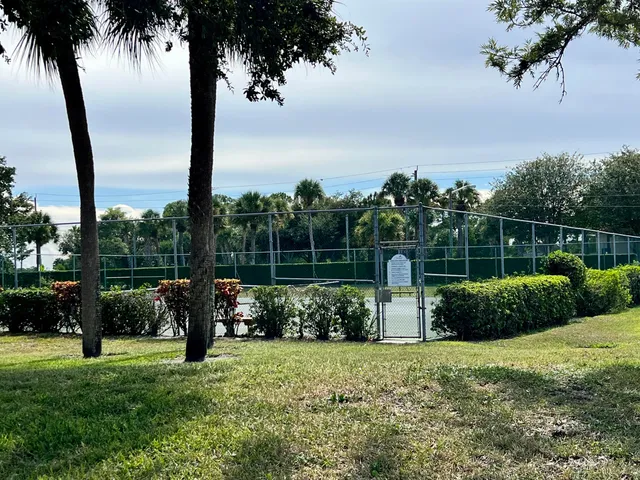 a garden view with a fountain