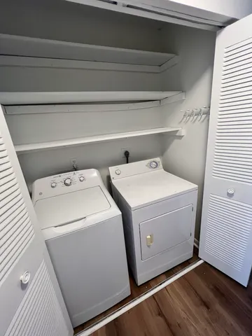 a utility room with dryer and washer