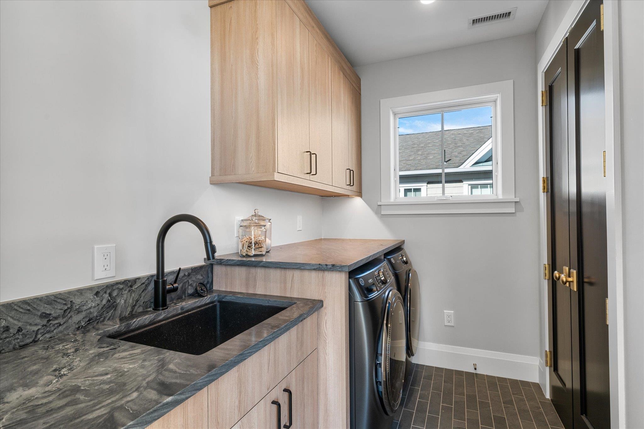 4277 5th Avenue Avalon, NJ 08202 - Photo 18 of 48 a kitchen with a sink a stove and cabinets