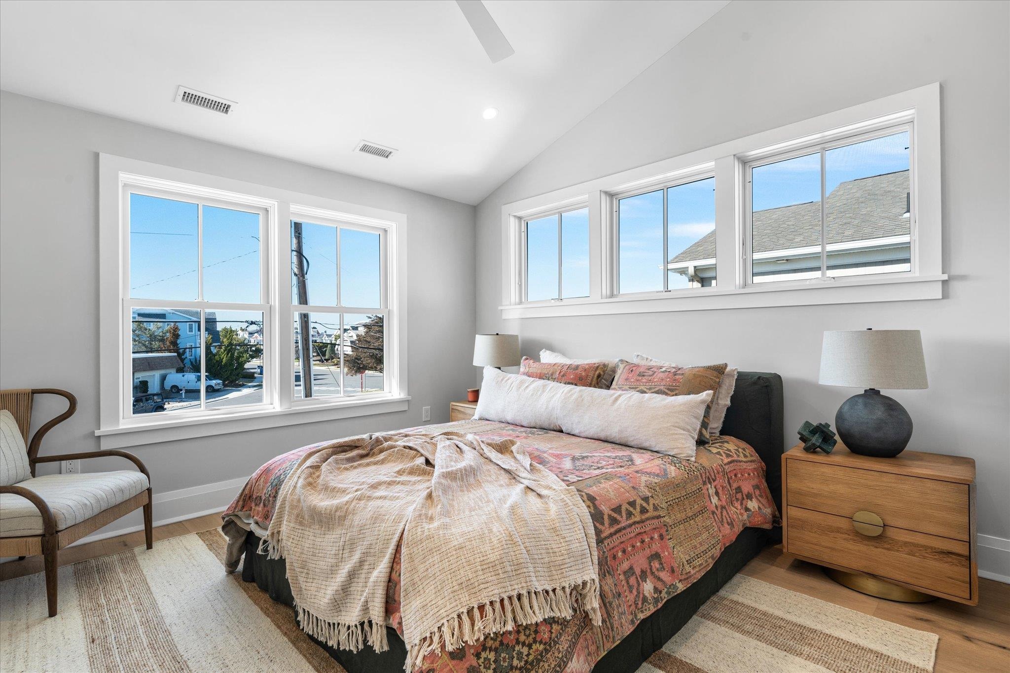 4277 5th Avenue Avalon, NJ 08202 - Photo 20 of 48 a bedroom with a bed and window