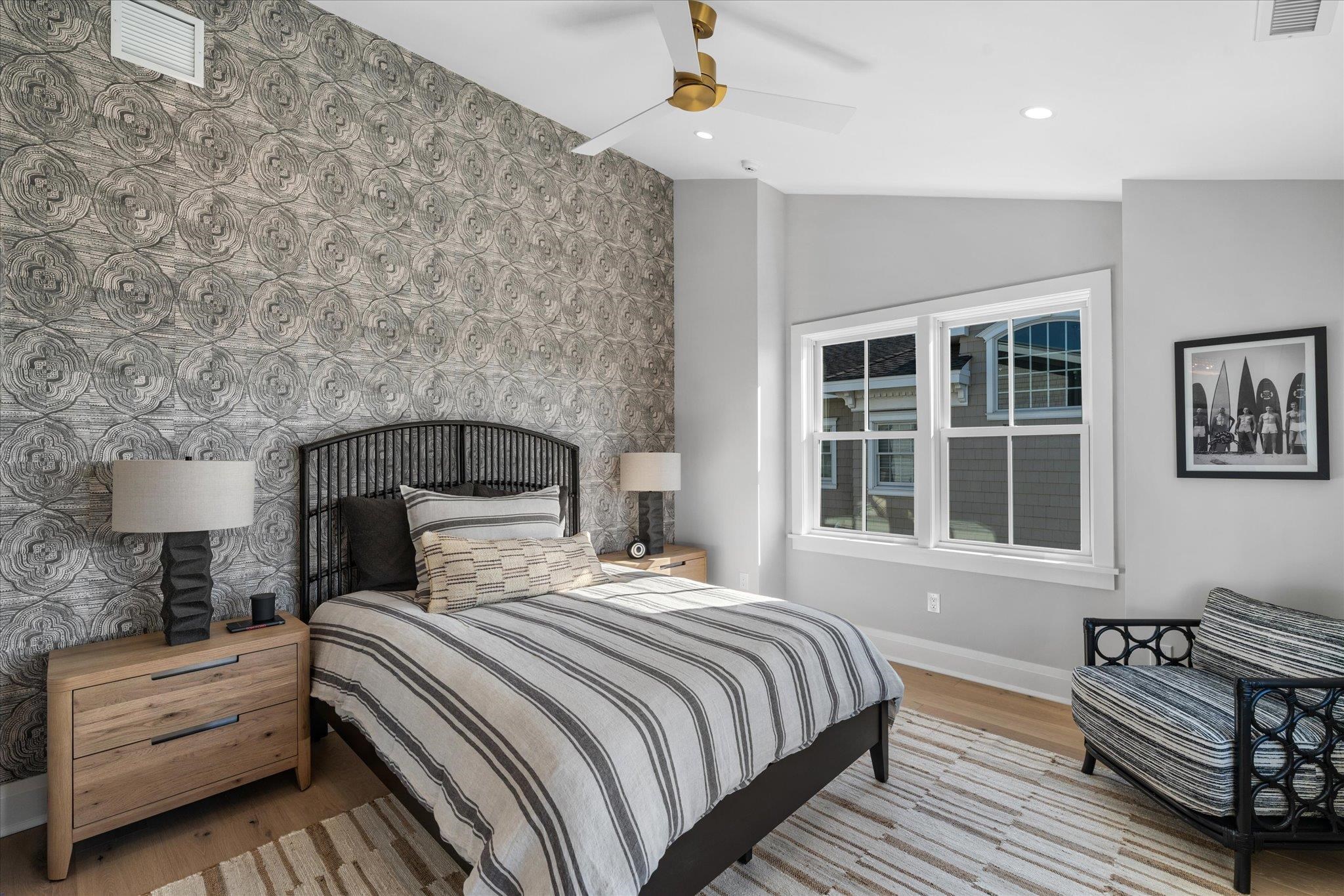 4277 5th Avenue Avalon, NJ 08202 - Photo 23 of 48 a bedroom with a bed and a window