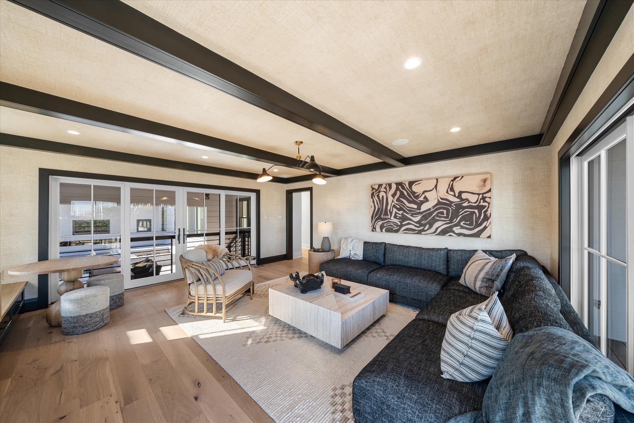 4277 5th Avenue Avalon, NJ 08202 - Photo 34 of 48 a living room with furniture and a large window