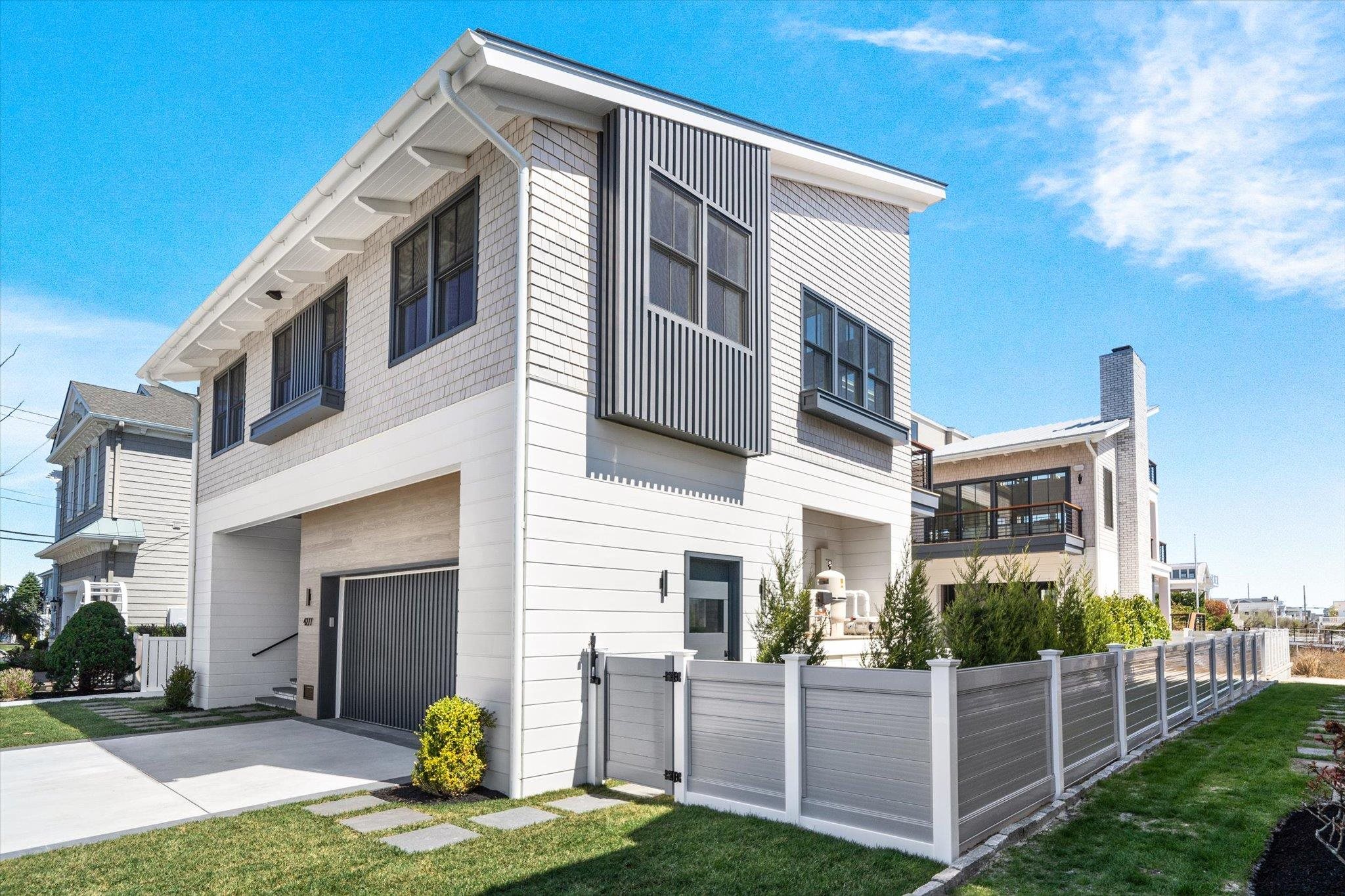 4277 5th Avenue Avalon, NJ 08202 - Photo 47 of 48 a front view of a house with a yard