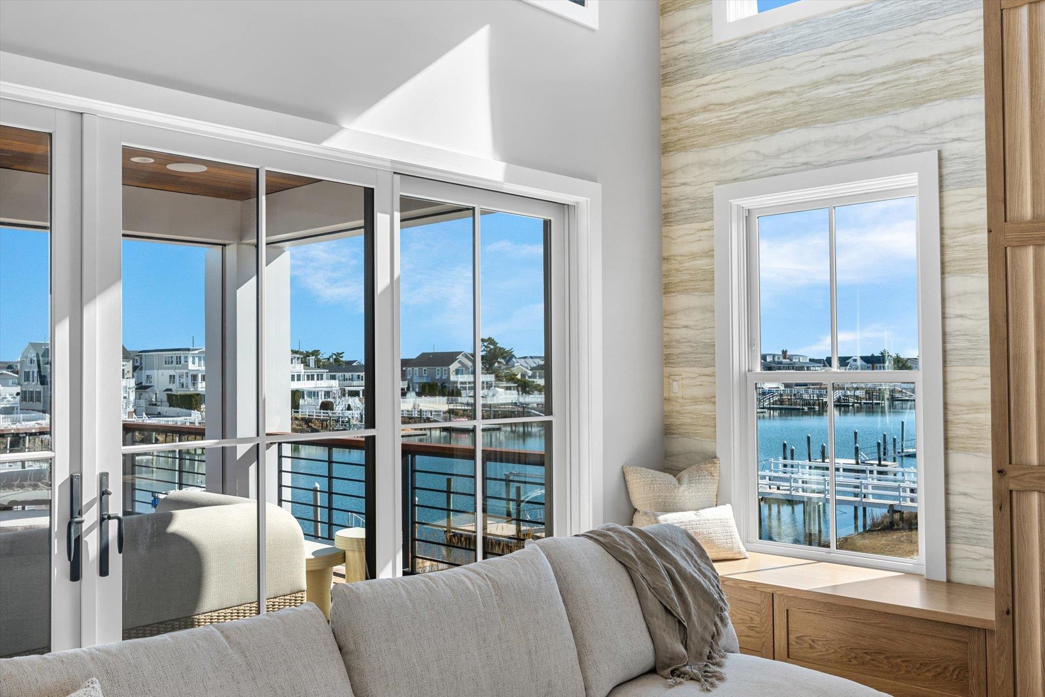 4277 5th Avenue Avalon, NJ 08202 - Photo 6 of 48 a bedroom with furniture and large windows