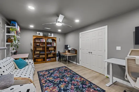a view of a workspace with furniture