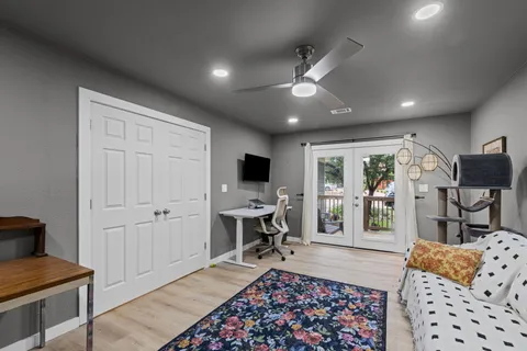 a bed room with a bed and furniture