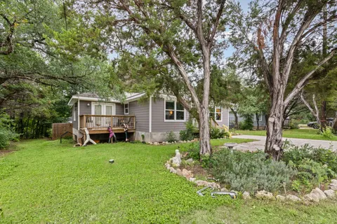 a view of backyard with trees