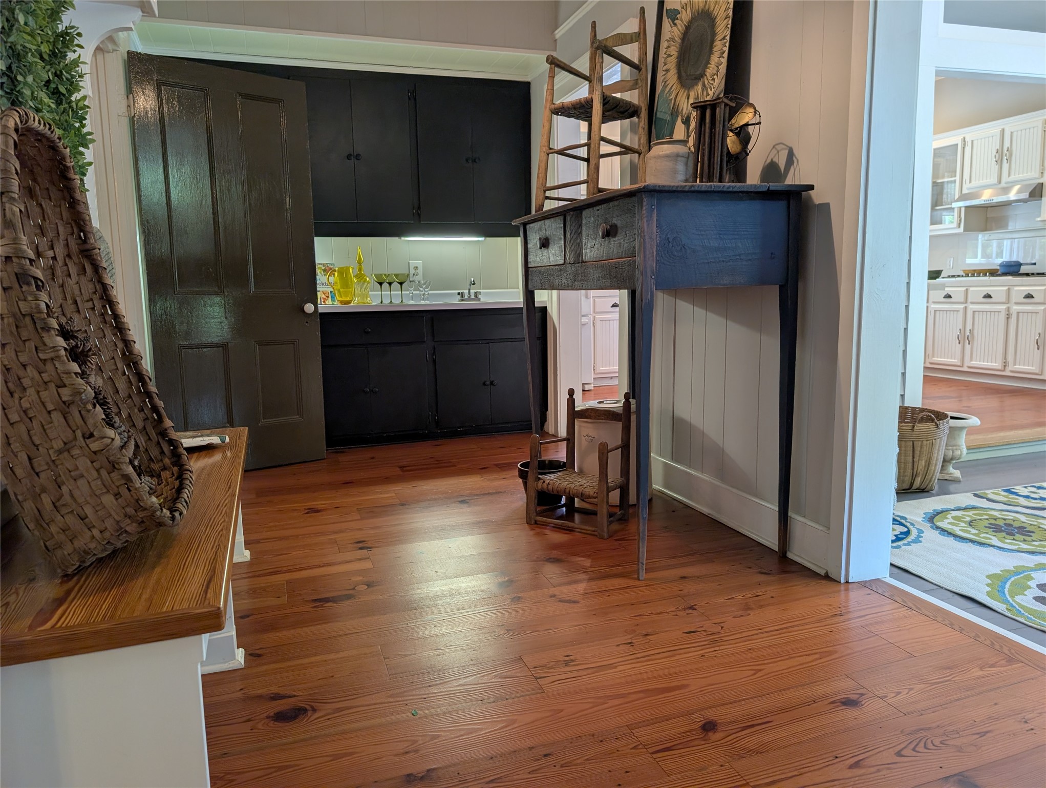 414 Spring Street Washington, GA 30673 - Photo 35 of 42 a view of workspace with wooden floor and wardrobe