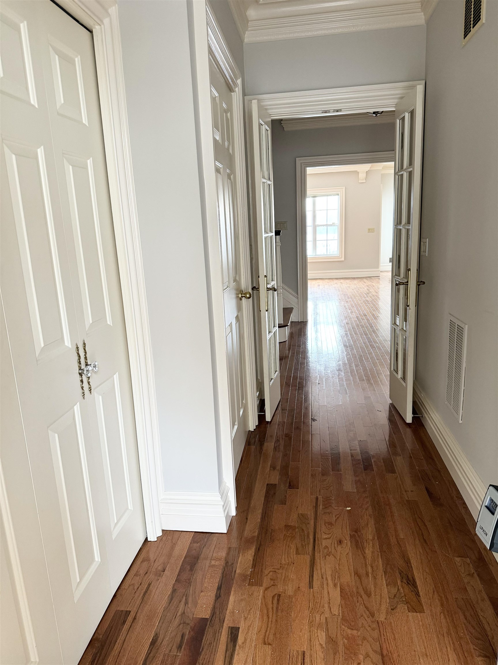 54 Bergen Ridge Road, Unit 1 North Bergen, NJ 07047 - Photo 5 of 16 a view of a hallway with wooden floor and staircase
