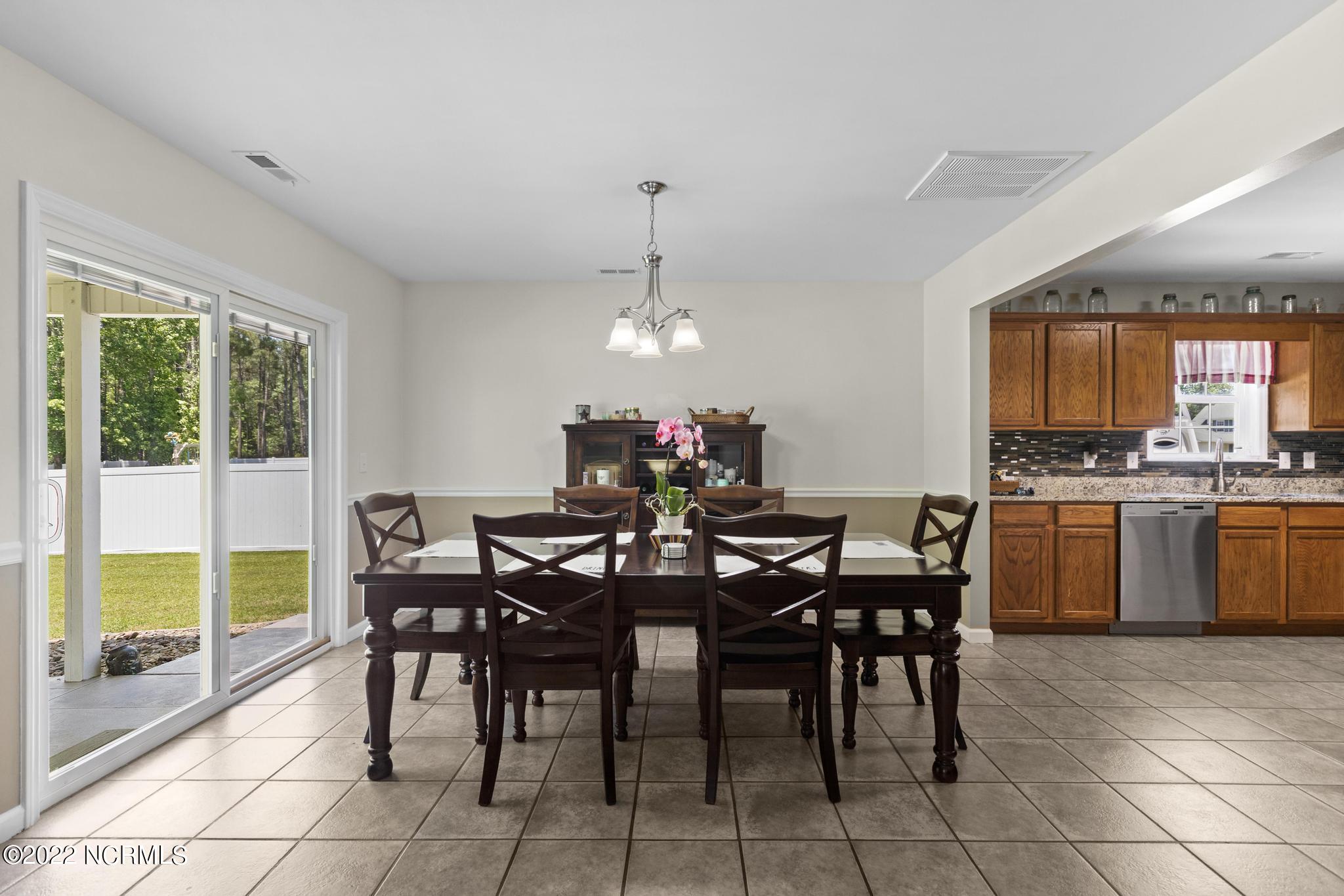 209 Portland Place Hubert, NC 28539 - Photo 9 of 32 Dining Room View From Living Room