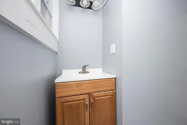 a view of a yard with a house and a tree