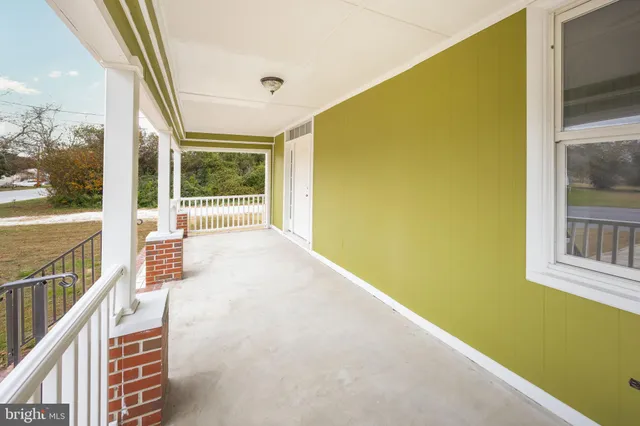 a kitchen with stainless steel appliances a refrigerator sink and cabinets