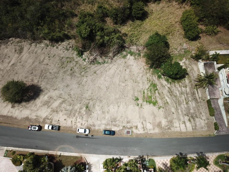 Ridge Top Humacao Prairie, Unit 25 Humacao, PR 00791 - Photo 1 of 1 a view of a street with a building in the background