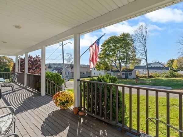 a view of balcony with furniture