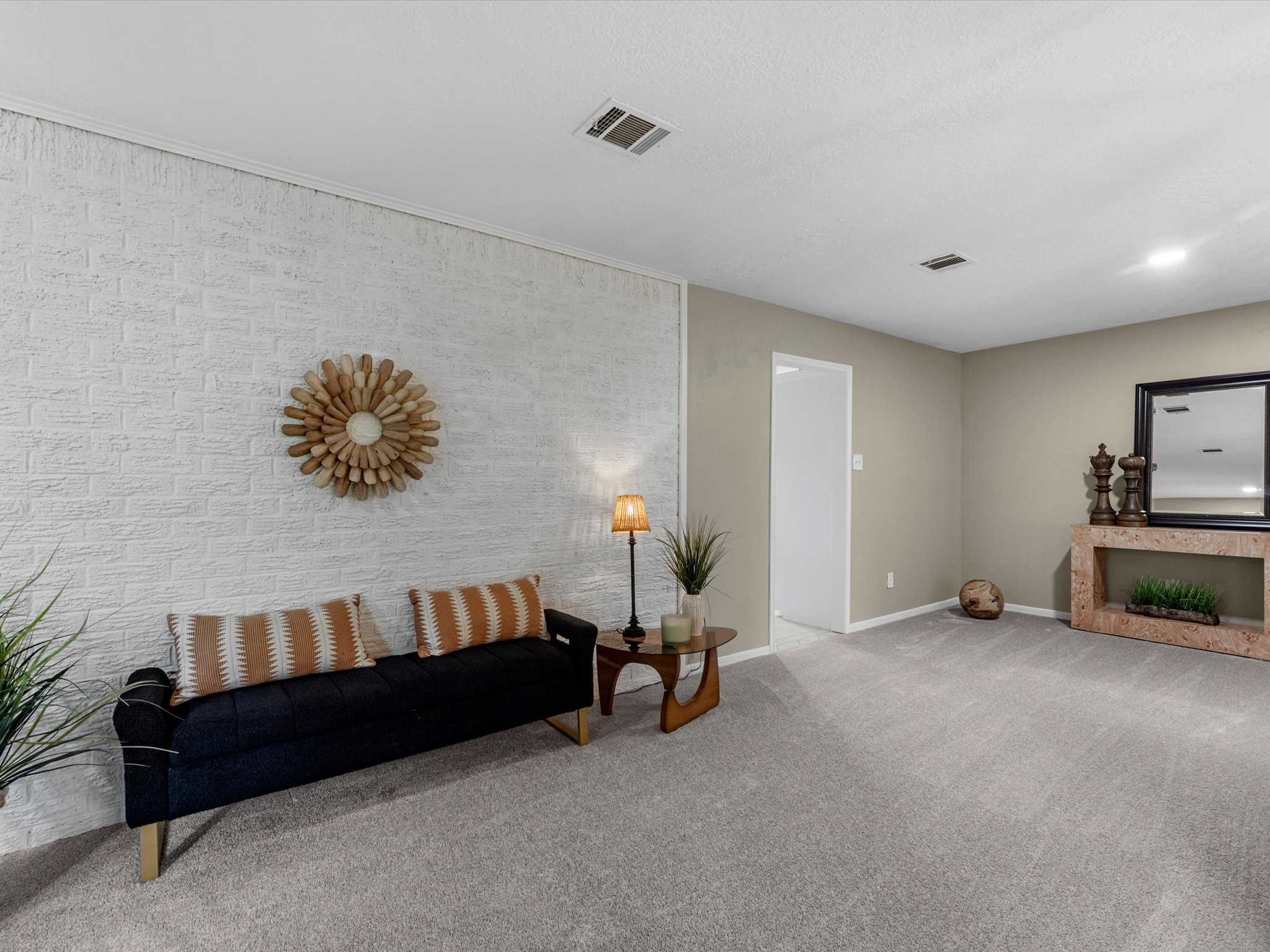4002 Cujanes Street Pasadena, TX 77504 - Photo 14 of 26 a spacious bedroom with a bed and a couch