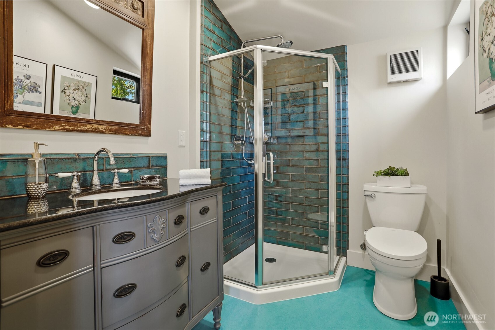 1749 Northwest 63rd Street Seattle, WA 98107 - Photo 25 of 40 a bathroom with a sink a toilet and shower