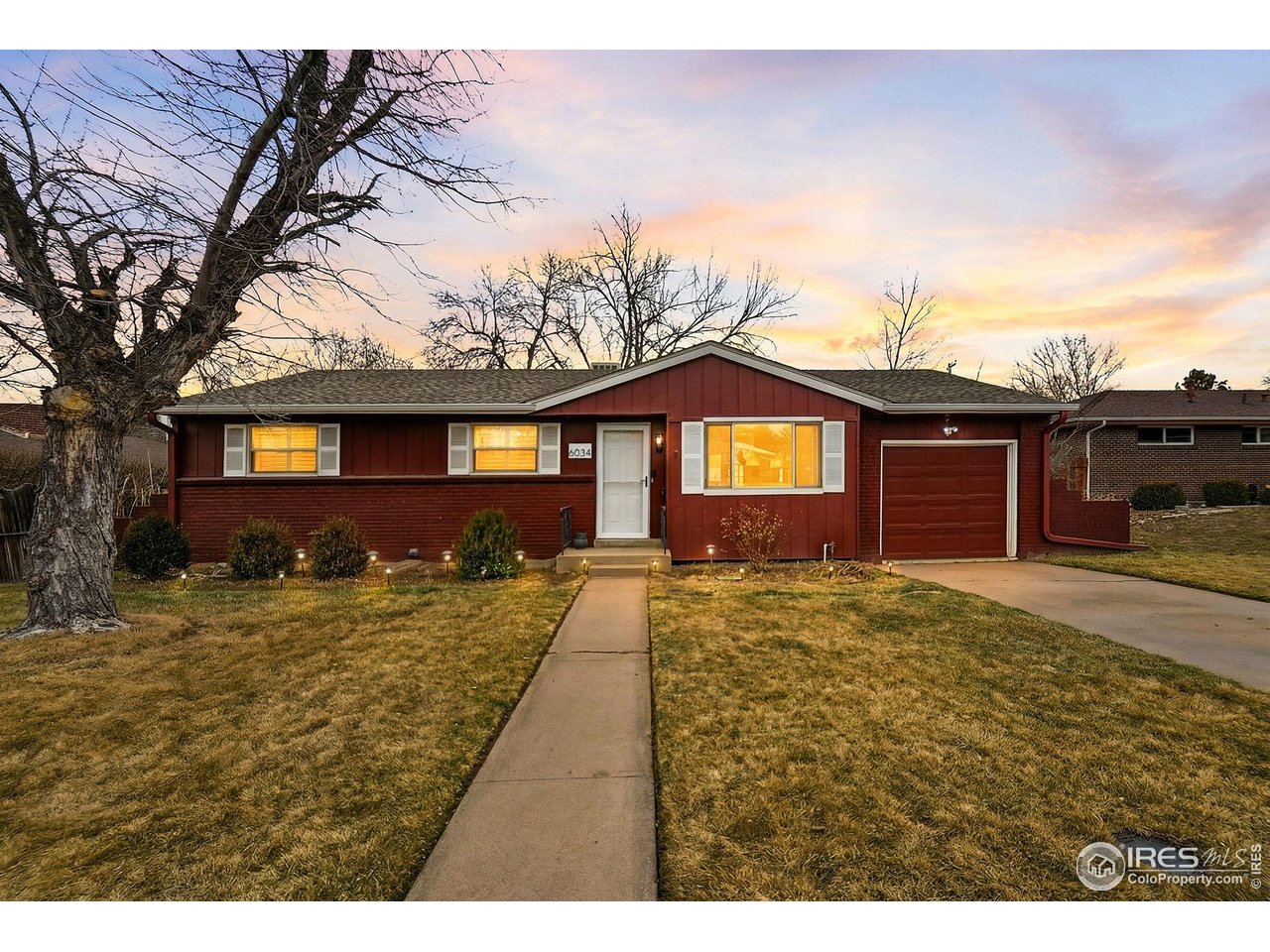 6034 South Steele Street Centennial, CO 80121 - Photo 1 of 46 a view of a house with a yard