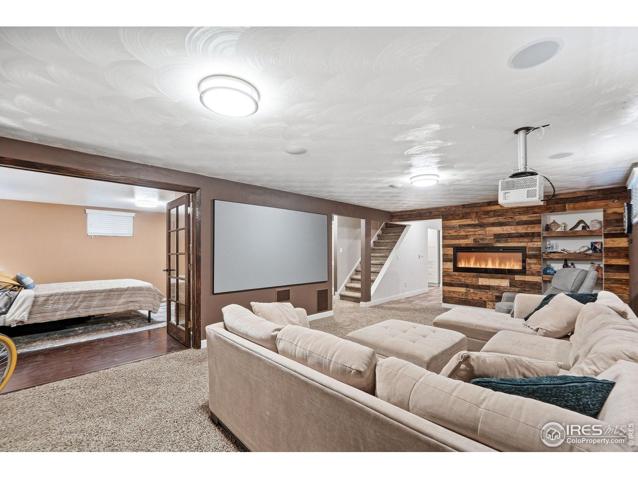 6034 South Steele Street Centennial, CO 80121 - Photo 22 of 46 a living room with furniture and a couch