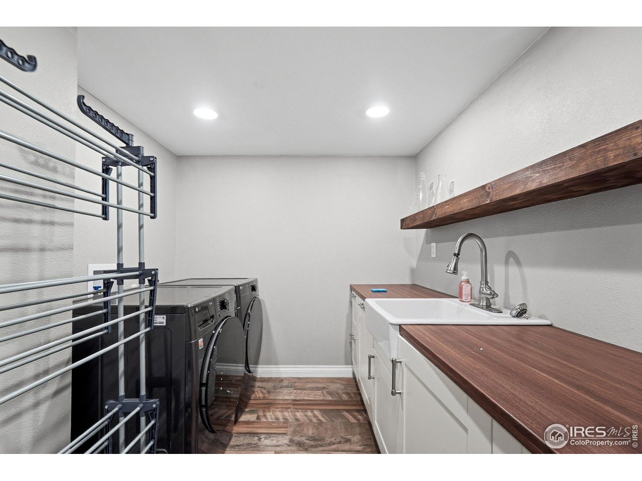 6034 South Steele Street Centennial, CO 80121 - Photo 25 of 46 a kitchen that has a sink and a stove