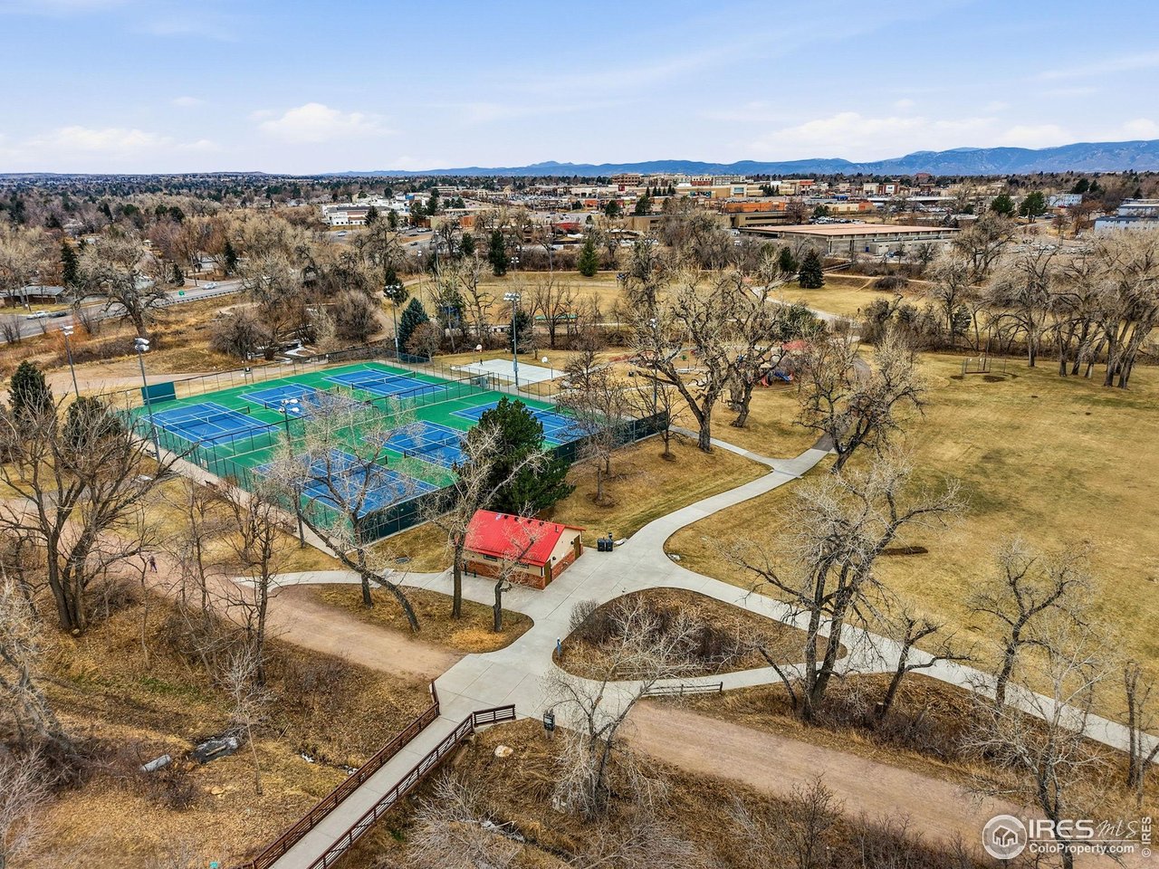 6034 South Steele Street Centennial, CO 80121 - Photo 43 of 46 an aerial view of a house with a yard