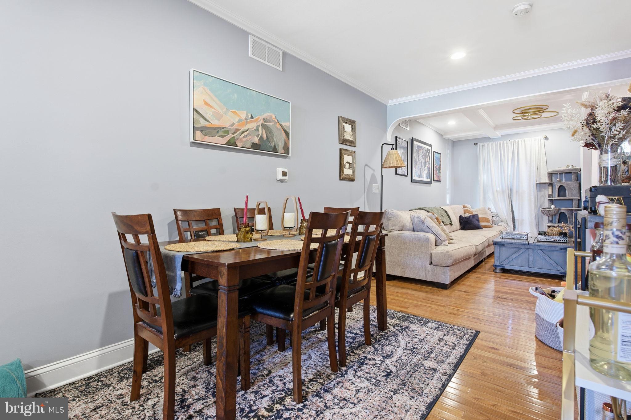 236 South Clinton Street Baltimore, MD 21224 - Photo 11 of 34 a view of a livingroom and dining room