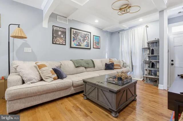 a living room with furniture and a couch