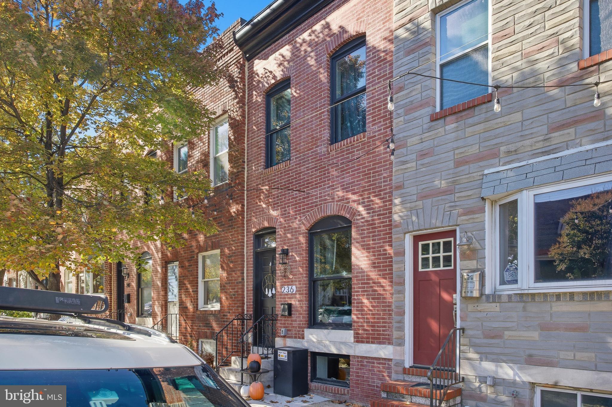 236 South Clinton Street Baltimore, MD 21224 - Photo 34 of 34 a front view of a building with street