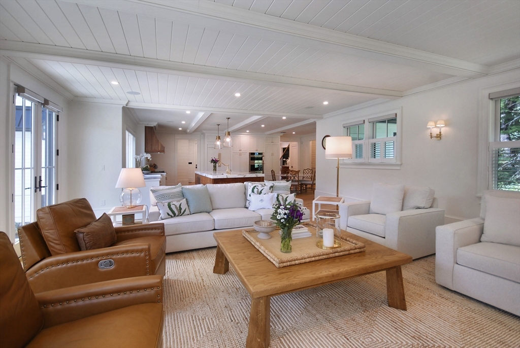 11 Williams Road Concord, MA 01742 - Photo 15 of 42 a living room with furniture wooden floor and a large window
