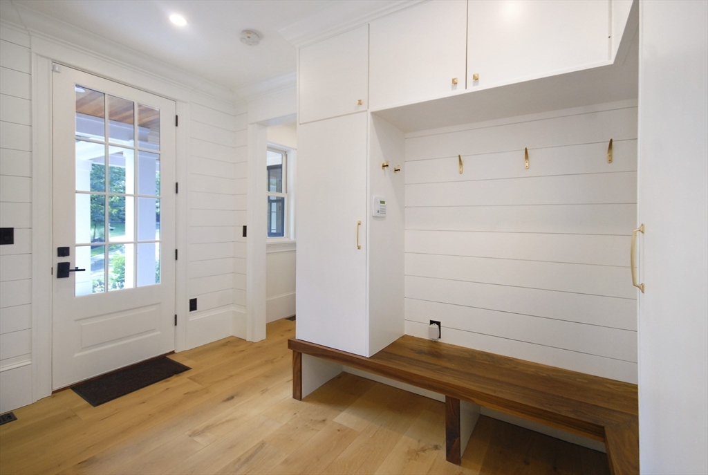 11 Williams Road Concord, MA 01742 - Photo 17 of 42 a room with wooden floor and white walls