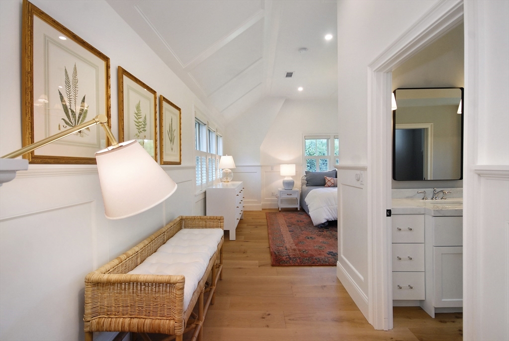 11 Williams Road Concord, MA 01742 - Photo 21 of 42 a bedroom with furniture and wooden floor