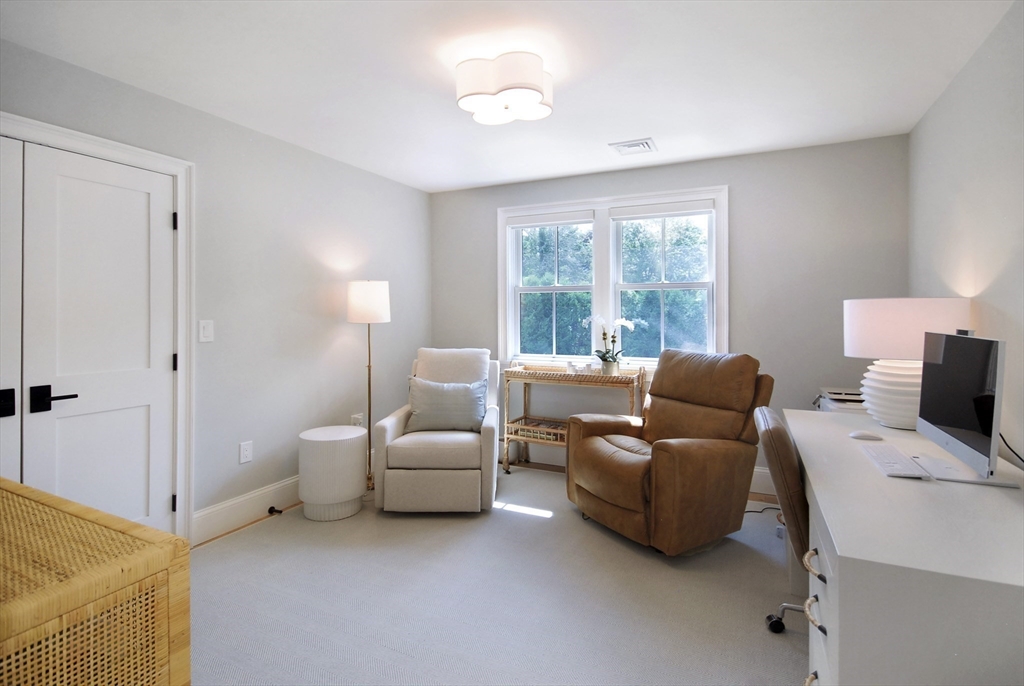 11 Williams Road Concord, MA 01742 - Photo 25 of 42 a living room with furniture and a window