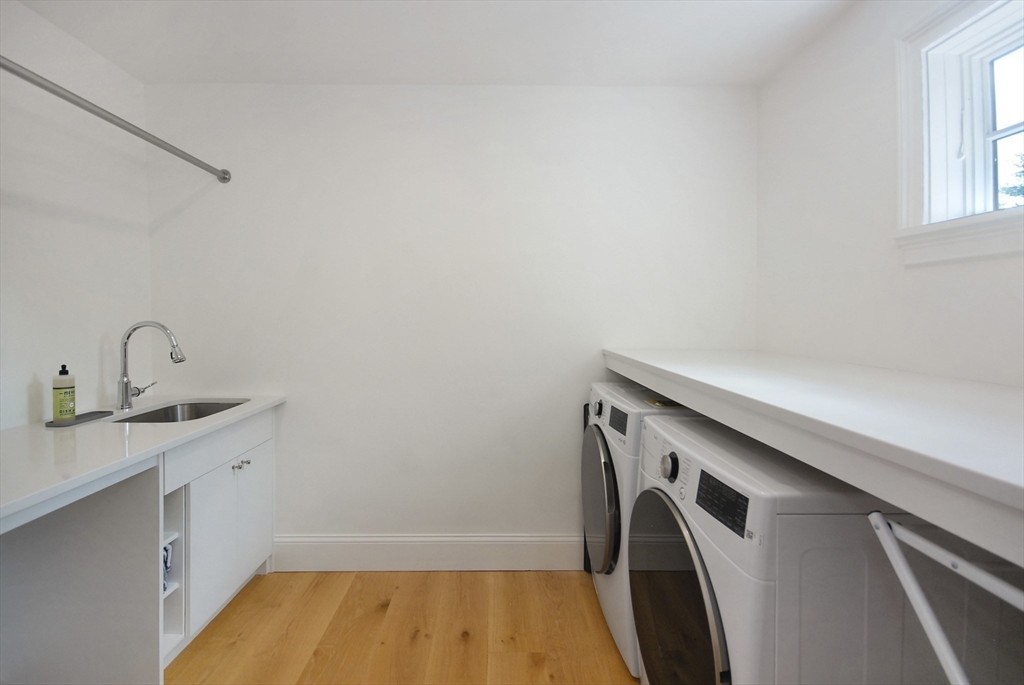 11 Williams Road Concord, MA 01742 - Photo 28 of 42 a utility room with dryer and washer